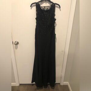 Women’s size 9 cocktail dress. B. Smart, full length with left leg slit. Lined